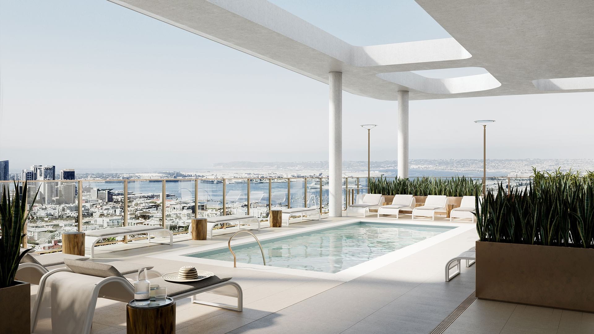 Large sparkling pool with sundecks located on the roof top