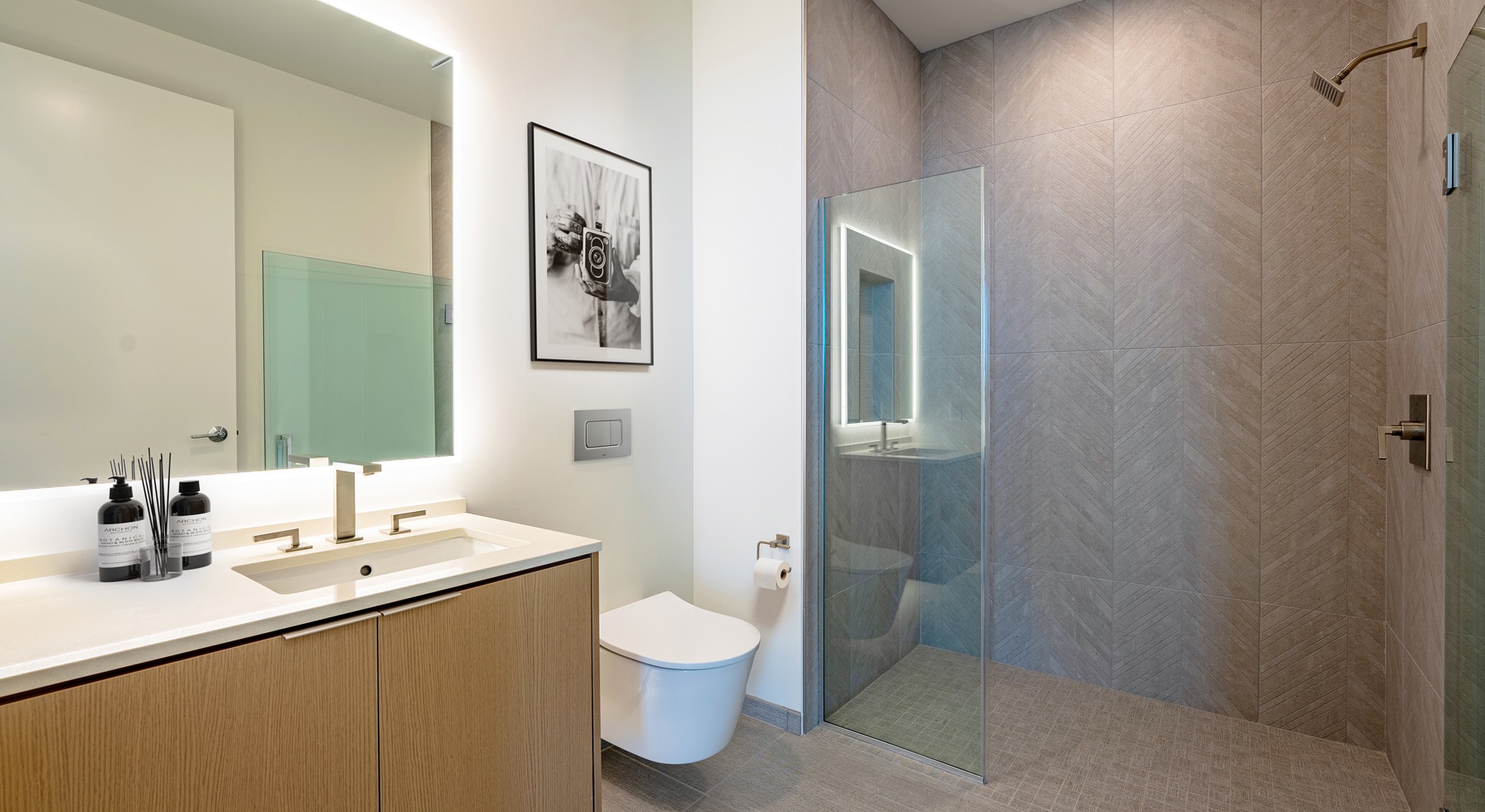 Bathroom with well-lit vanity